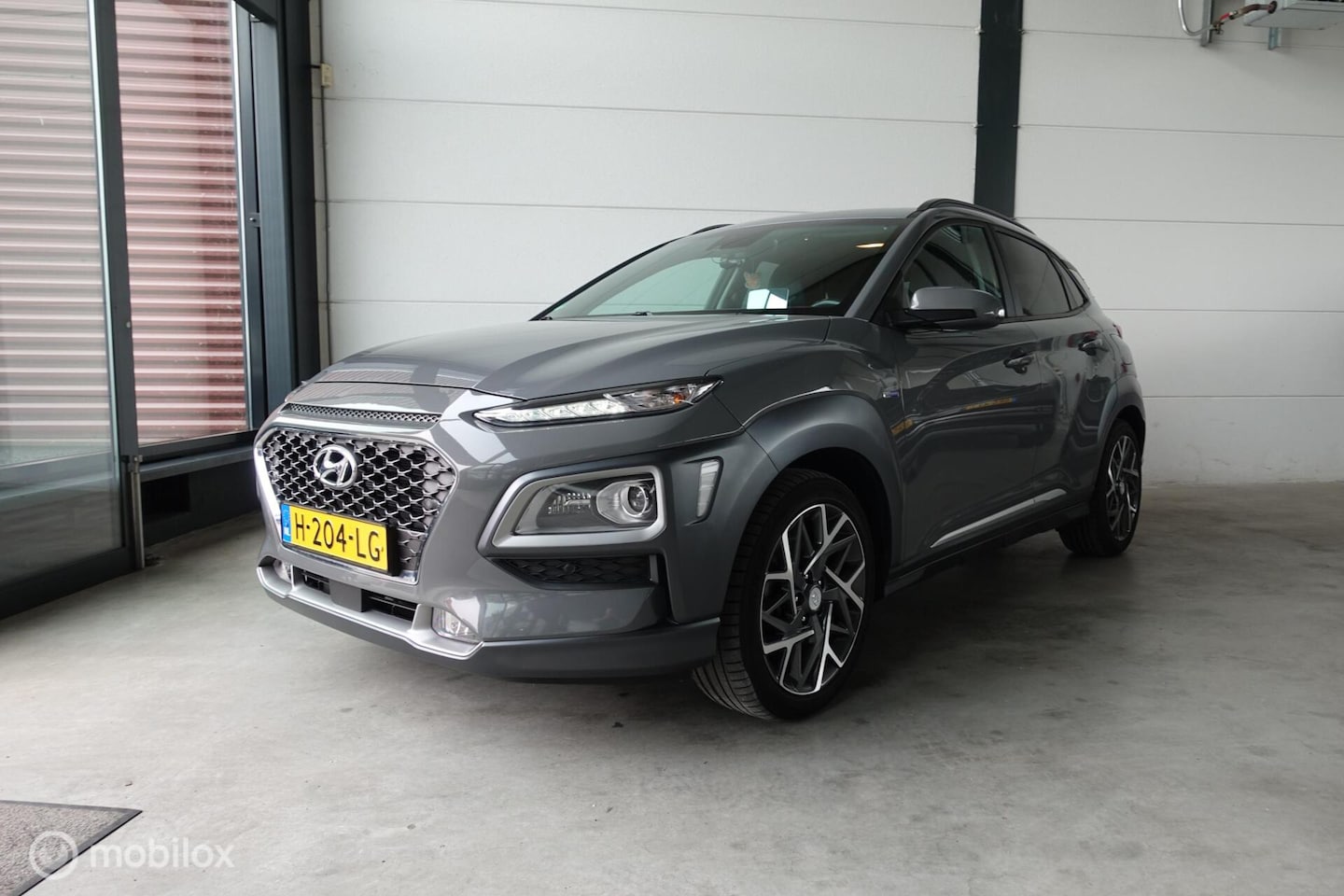 Hyundai Kona - 1.6 GDI HEV Premium Sky FULL OPTION - AutoWereld.nl