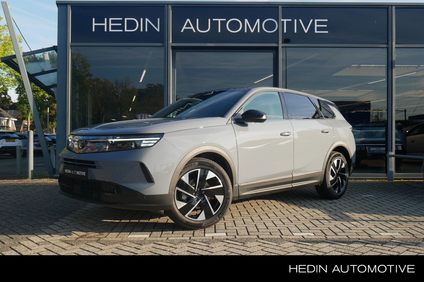 Opel Grandland - 1.2 Turbo Hybrid Business Edition | Lederen bekleding met massage functie | Afneembare tre - AutoWereld.nl