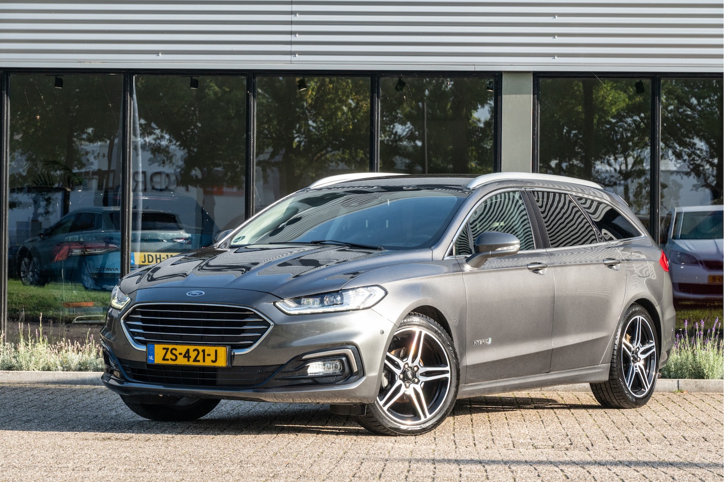 Ford Mondeo Wagon - 2.0 IVCT HEV Titanium | Navi | Camera | Adapt. Cruise | Elek. Achterklep | Elek. best. sto - AutoWereld.nl