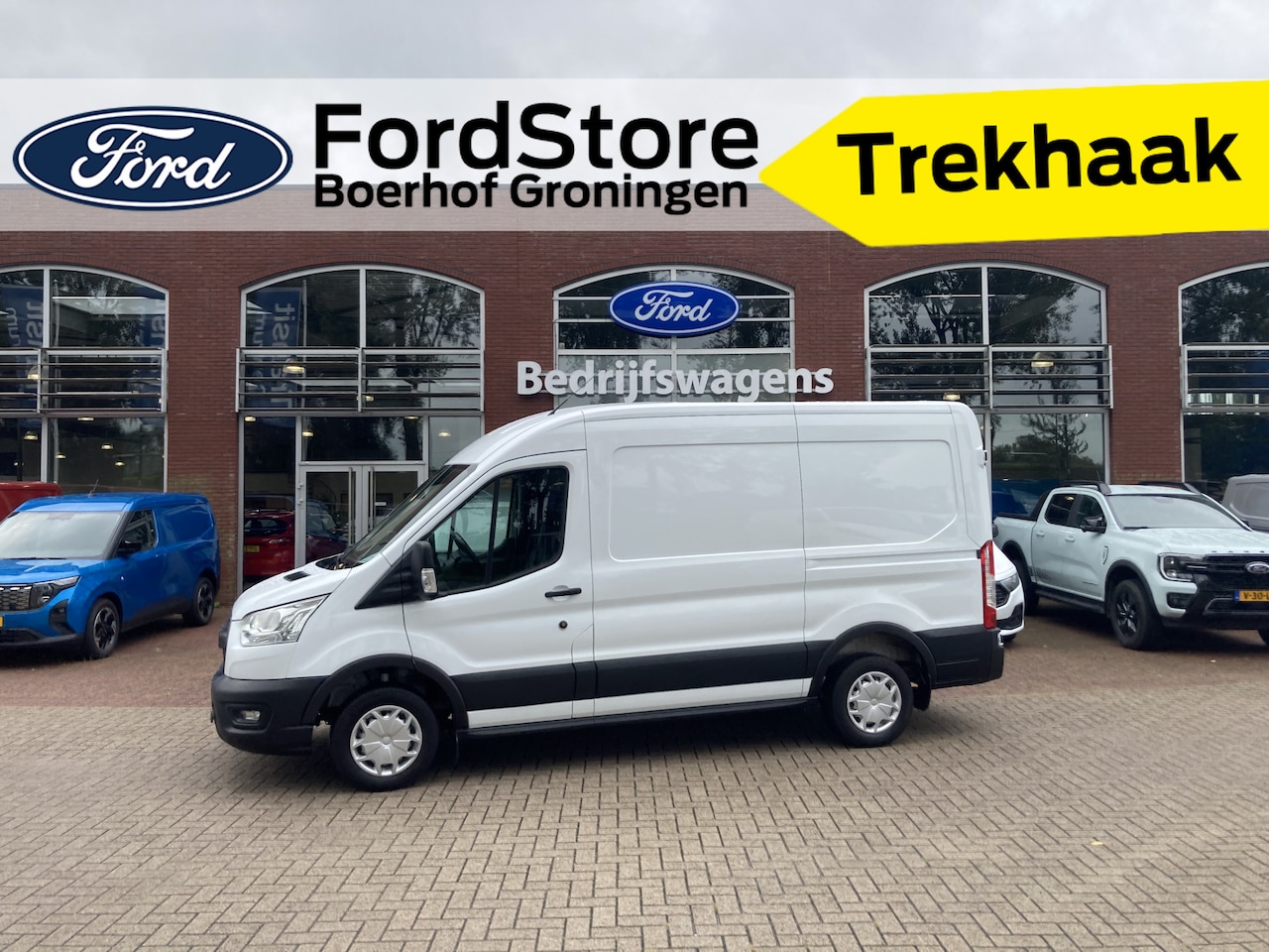 Ford Transit - 310 2.0 TDCI L2H2 Trend | Camera | Parkeersensoren | Trekhaak | Voorruitverwarming - AutoWereld.nl