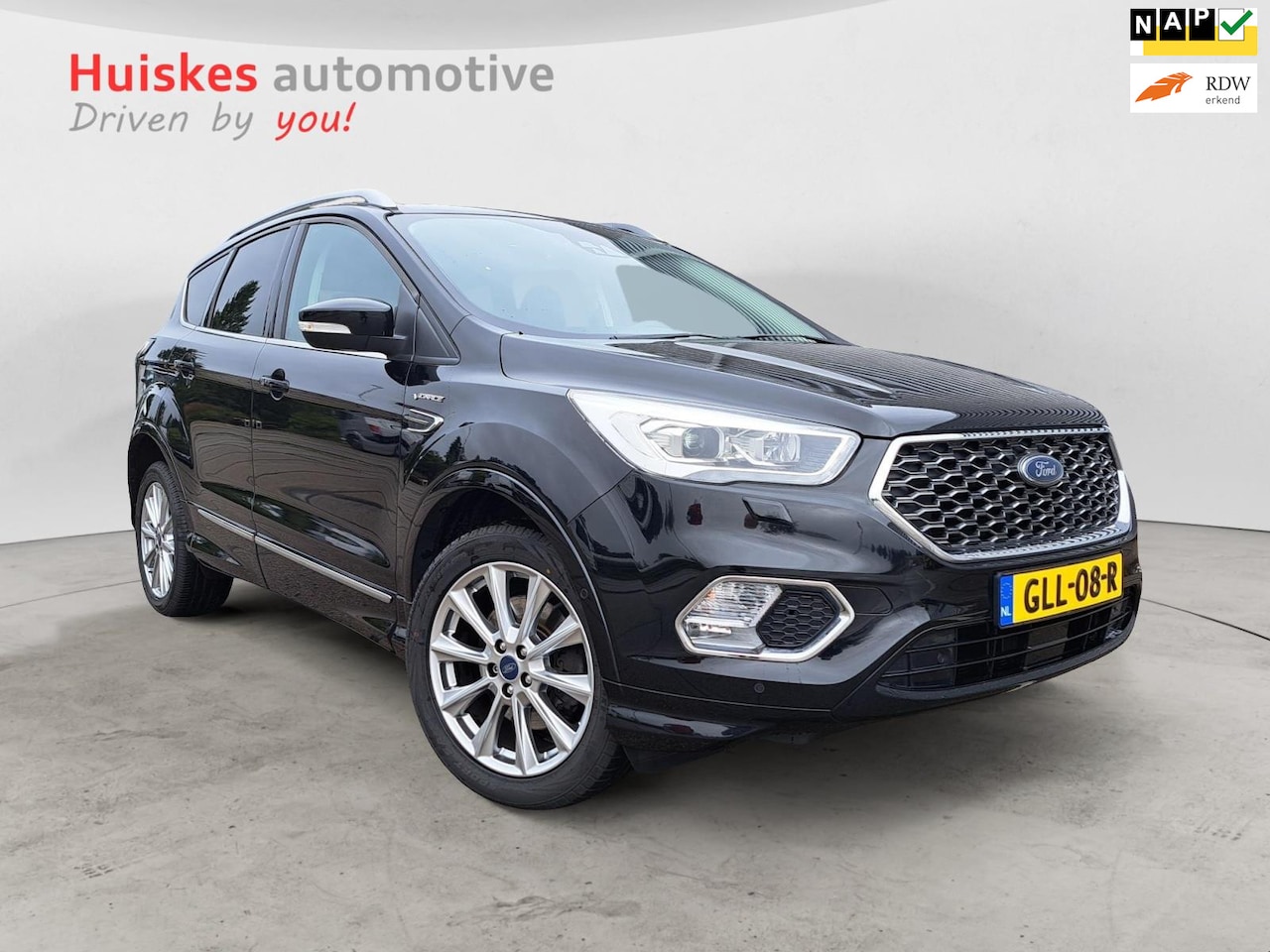 Ford Kuga - 1.5 EcoBoost Vignale Pano/adaptive/leer/AWD/trekhaak - AutoWereld.nl