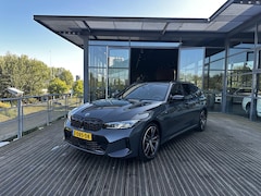 BMW 3-serie Touring - M340i xDrive | DRAVITGRAU | PANORAMA/SCHUIF-KANTELDAK | HARMAN KARDON | 19 INCH | STOELMEM