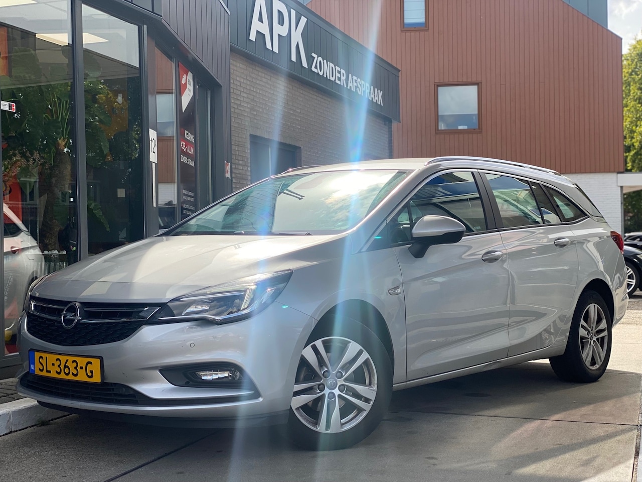 Opel Astra Sports Tourer - 1.4 Online Edition | Airco | Cruise control | Parkeersens. - AutoWereld.nl