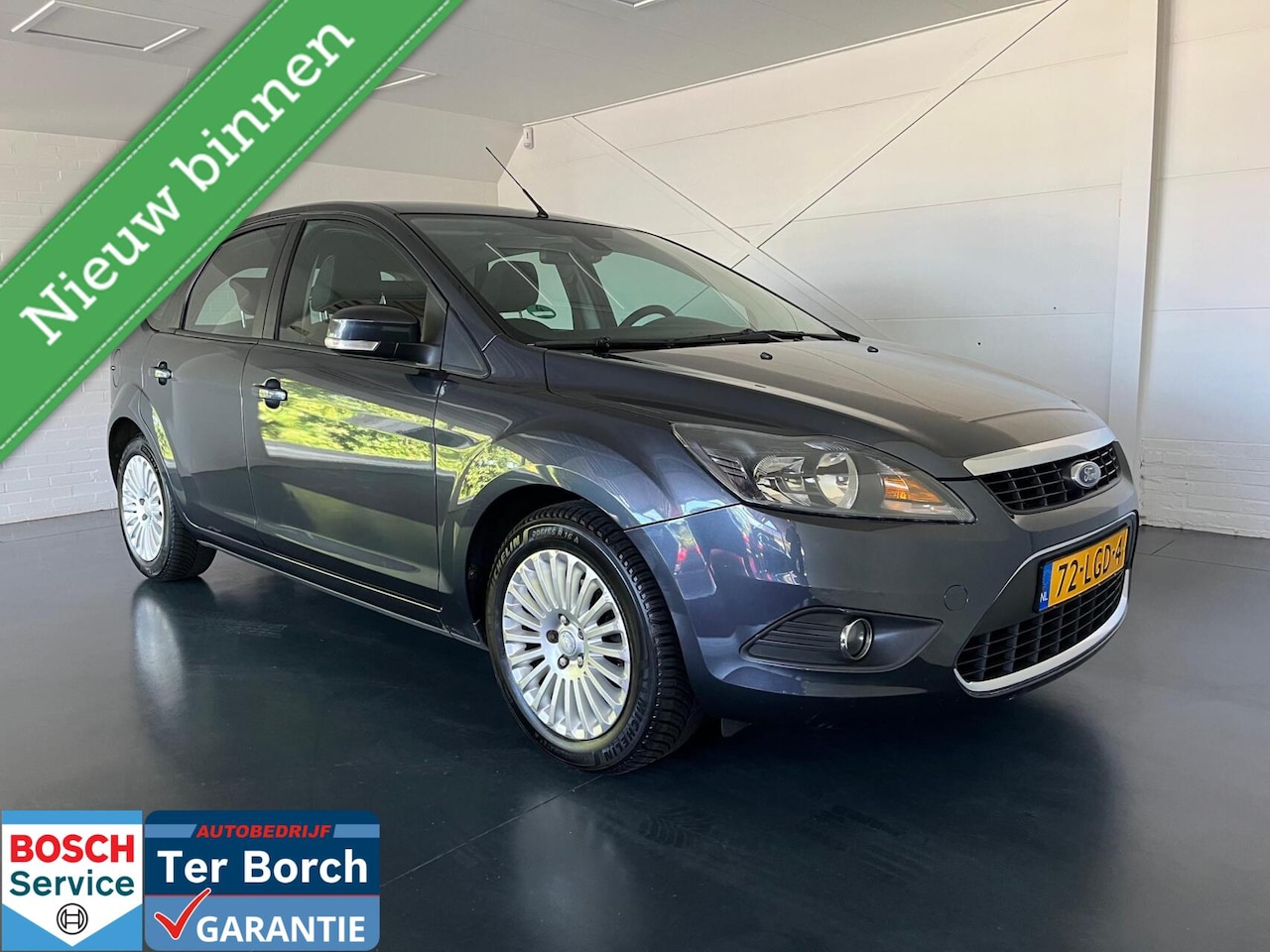Ford Focus - 1.6 Titanium Automaat Trekhaak All-seasen - AutoWereld.nl