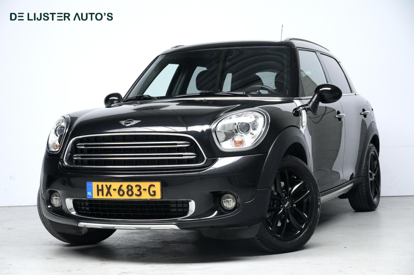 MINI Countryman - 1.6 Cooper Chili | Navigatie | Cruise | Leder + Verwarmd |Climate | Bluetooth | Pdc | Xeno - AutoWereld.nl