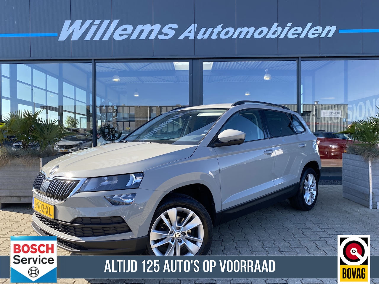 Skoda Karoq - 1.0 TSI Business Edition Wegklapbare Trekhaak, App Connect & Cruise Control - AutoWereld.nl