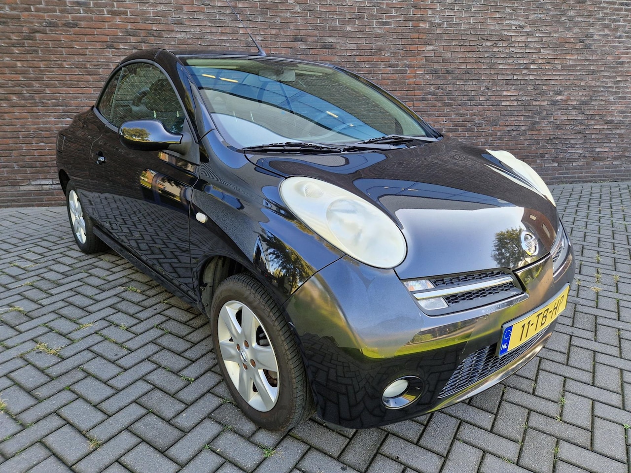 Nissan Micra - 1.4 Tekna cabrio LM Velgen APK 09-2026 NAP - AutoWereld.nl