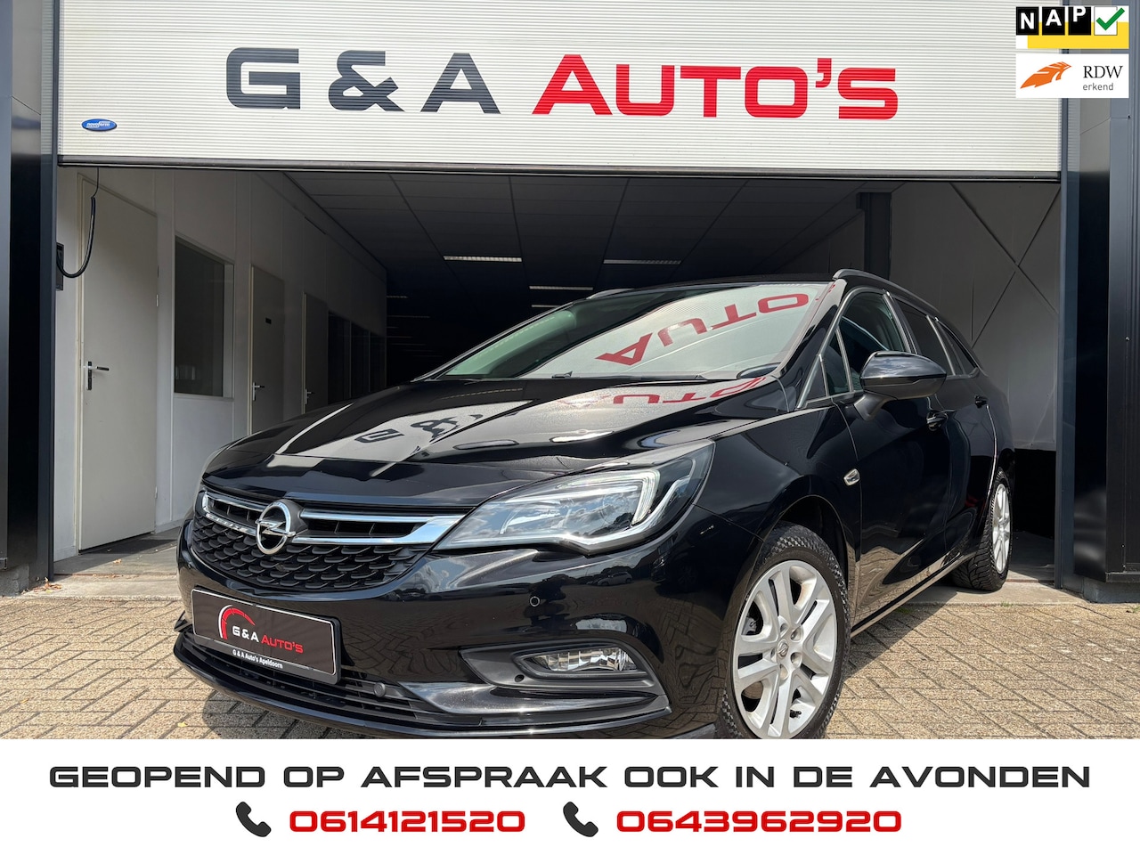 Opel Astra Sports Tourer - 1.4 / PDC / CRUISE CTRL / CARPLAY / STOEL+STUUR VERW / AC - AutoWereld.nl