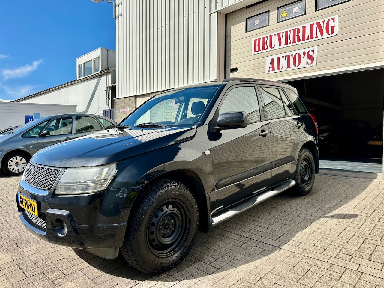 Suzuki Grand Vitara - 2.0-16V Exclusive | Airco | 4x4 | Trekhaak - AutoWereld.nl