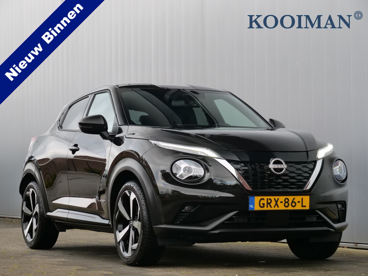 Nissan Juke - 1.6 Hybrid N-Design 143pk Tekna Navigatie / Leer / LED / 19Inch / Trekhaak - AutoWereld.nl