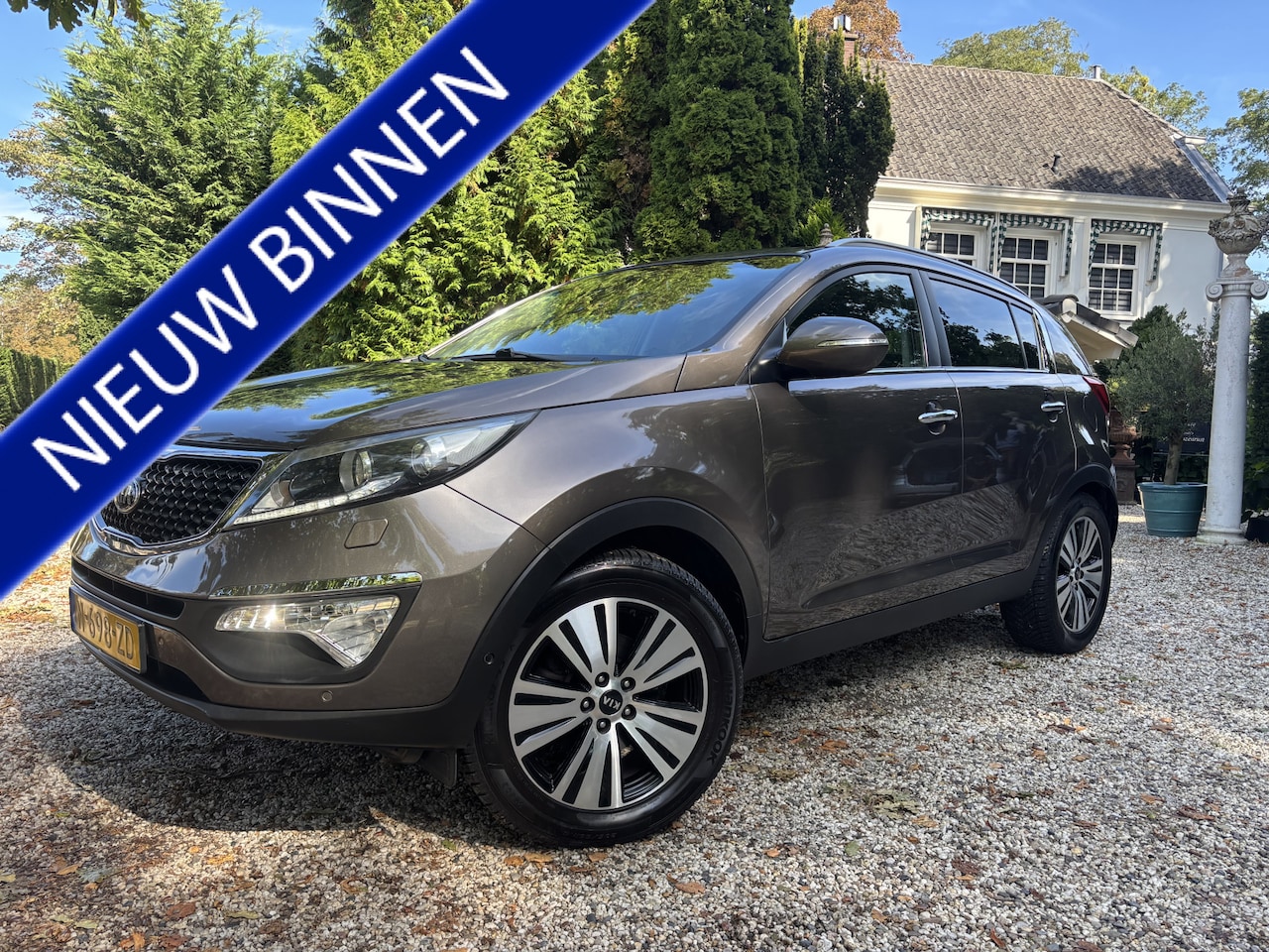Kia Sportage - 2.0 BusinessPlusLine / Airco / Navi. / Camera - AutoWereld.nl