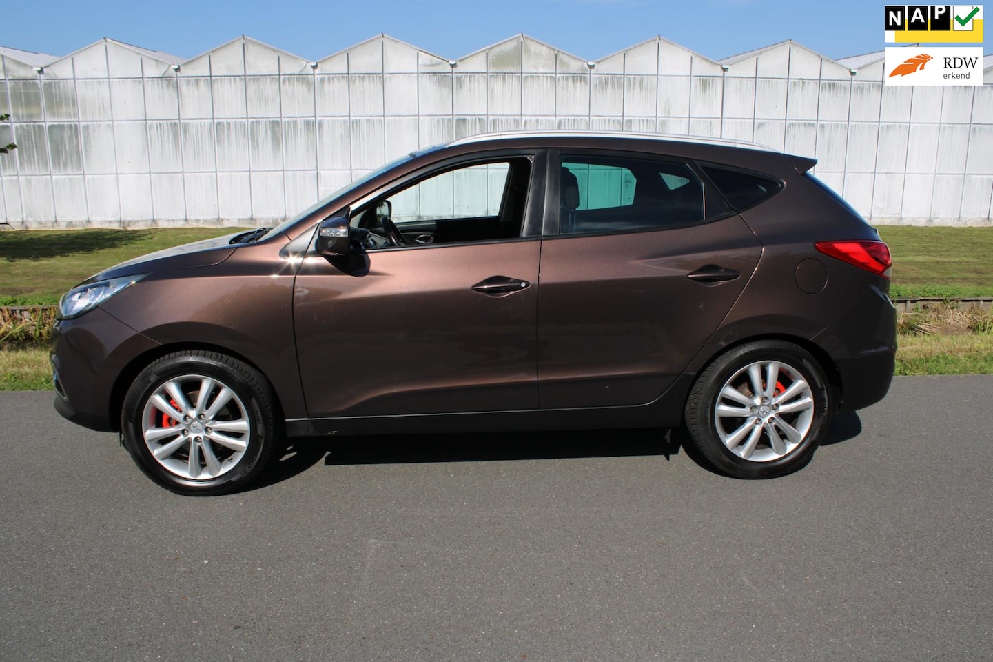 Hyundai ix35 - 2.0i i-Catcher Automaat met Leder en Navigatie - AutoWereld.nl