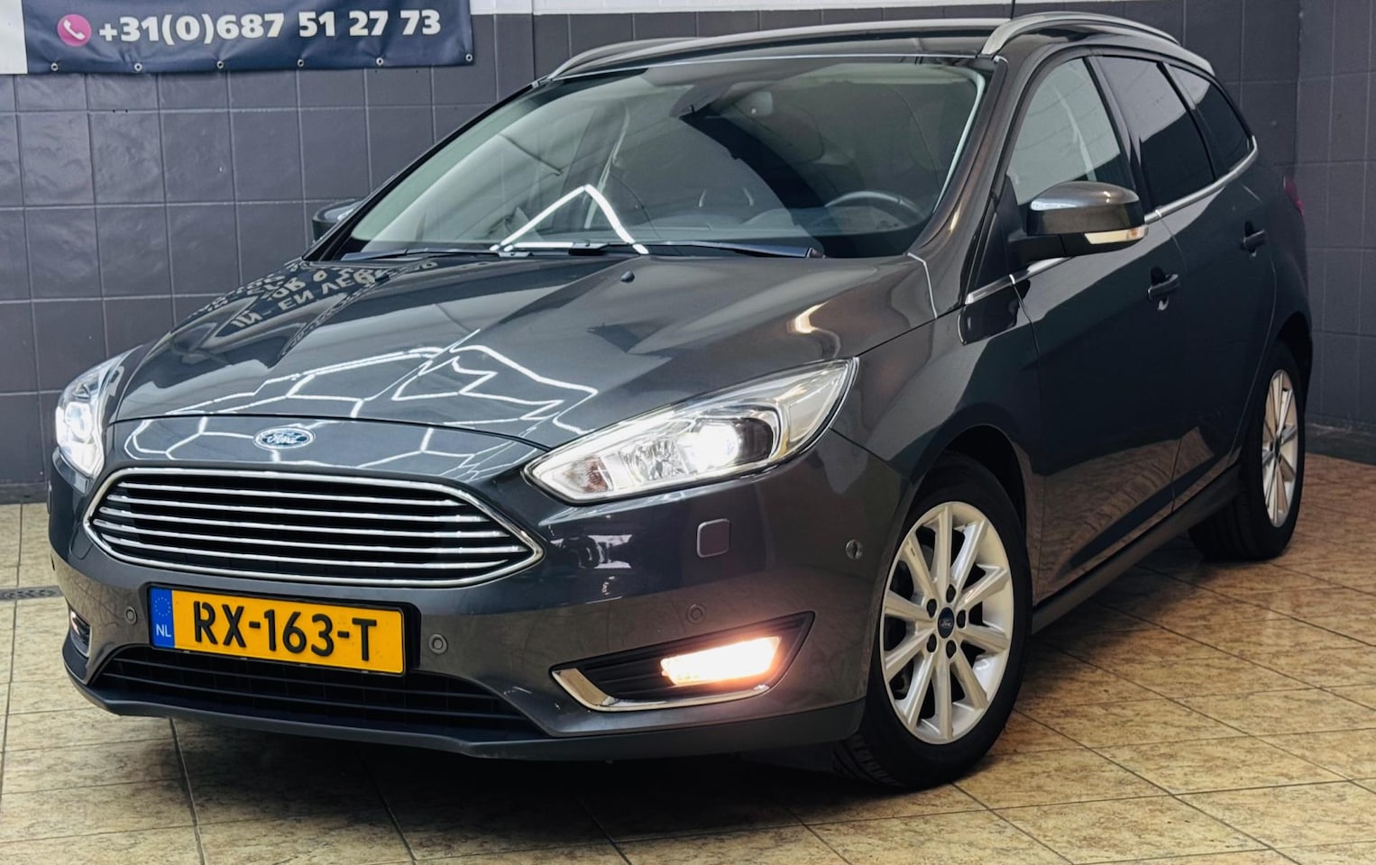 Ford Focus Wagon - 1.0 Titanium /GARANTIE/TOP STAAT/RIJKLAAR/ - AutoWereld.nl