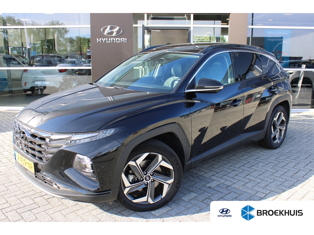 Hyundai Tucson - 1.6 T-GDI 265pk PHEV Premium Sky 4WD | Schuifkanteldak | 360 camera | Lederen bekleding | - AutoWereld.nl