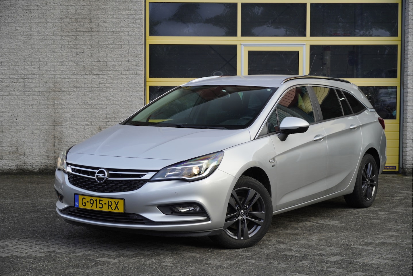Opel Astra Sports Tourer - 1.0 Turbo 120 Jaar Edition BJ2019 Lmv 16" | Led | Pdc | Navi | Climate control | Cruise co - AutoWereld.nl