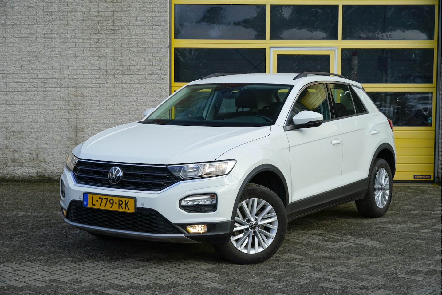Volkswagen T-Roc - 1.5 TSI 150PK! Style BJ2021 Lmv 16" | Led | Pdc | Navi | App-Connect | Climate control | C - AutoWereld.nl