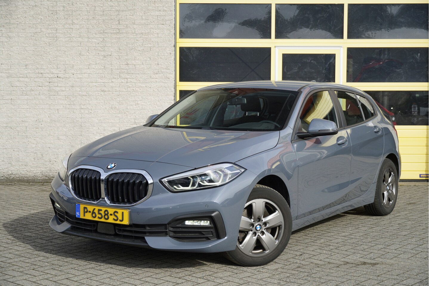 BMW 1-serie - 118i Automaat! Business Edition BJ2022 Lmv 16" | Led V+A | Pdc | Navi | Virtual cockpit | - AutoWereld.nl