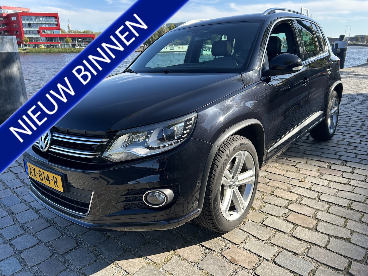 Volkswagen Tiguan - 1.4 TSI R-Line Edition automaat panodak navi leer - AutoWereld.nl