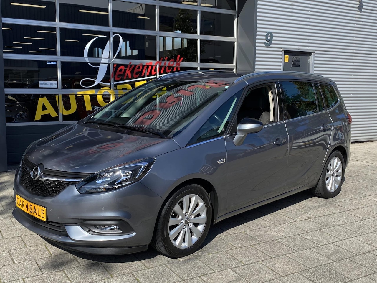Opel Zafira Tourer - 1.4 T Business Executive 7p. - Automaat I Navigatie I Airco I Sport velgen I PDC I Dealer - AutoWereld.nl