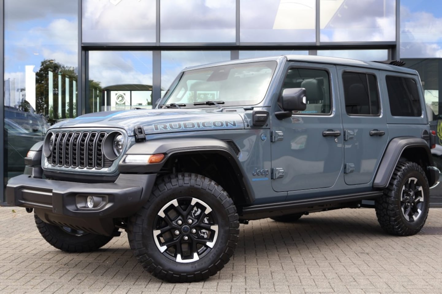 Jeep Wrangler - NIEUW PLUG-IN HYBRID RUBICON 4XE / My Sky One Touch - AutoWereld.nl