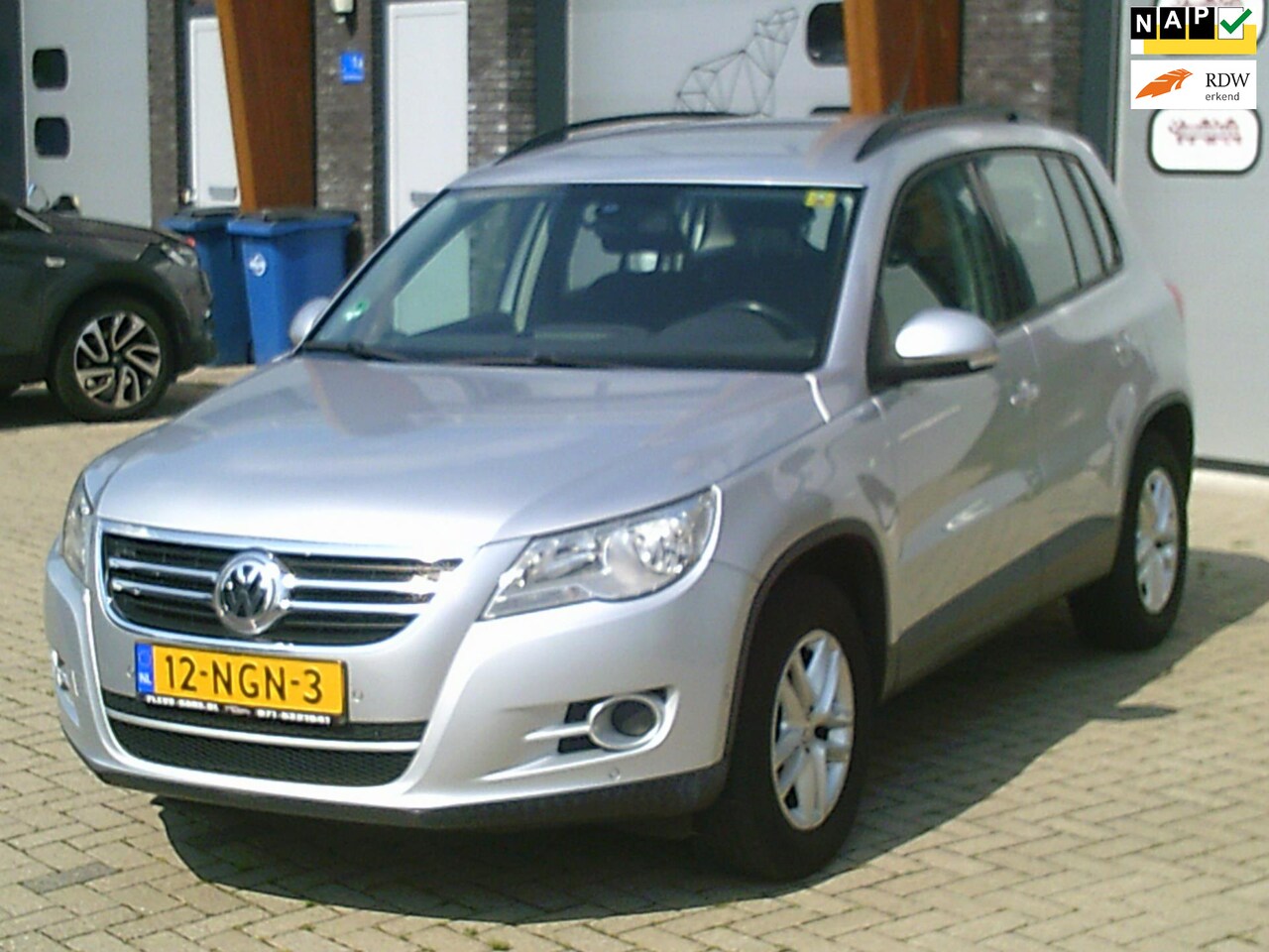 Volkswagen Tiguan - 1.4 TSI Comfort&Design Grote Onderhoudsbeurt Airco Cruise Navi - AutoWereld.nl