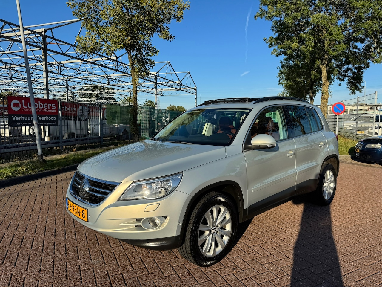 Volkswagen Tiguan - 2.0 TSI Sport&Style 4MotionAUTOMAAT PANO - AutoWereld.nl