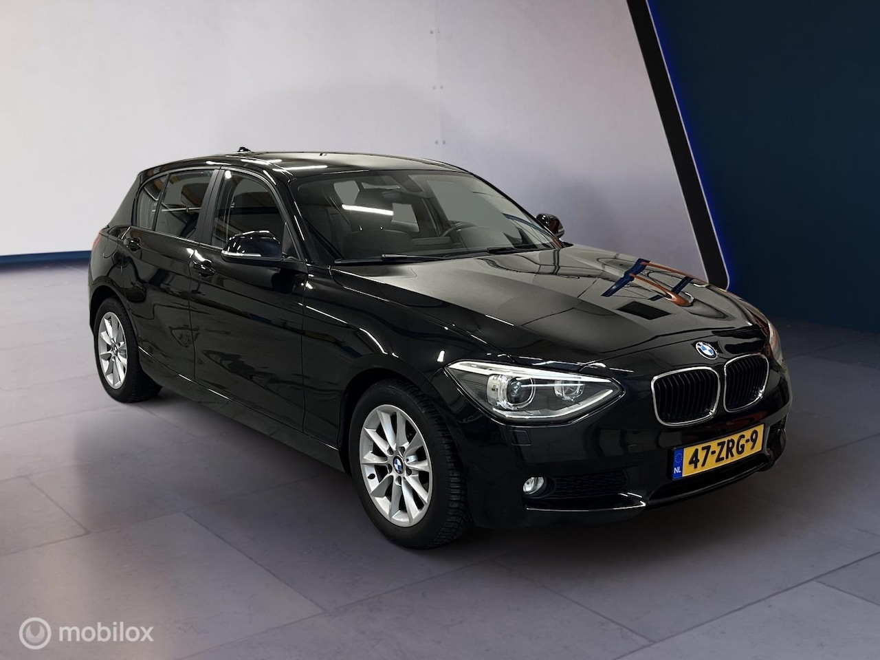 BMW 1-serie - 116i Upgrade Edition Leer/Xenon/Trekh./Stoelver. - AutoWereld.nl