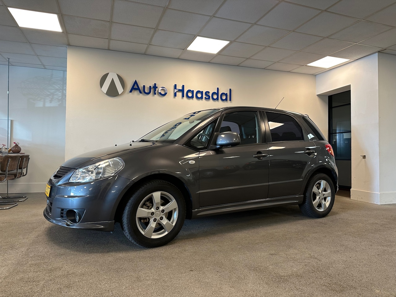 Suzuki SX4 - 1.6 Exclusive|TREKHAAK|KEYLESS|CLIMA|STOELVERWARMING - AutoWereld.nl