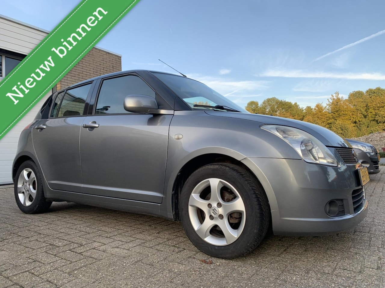 Suzuki Swift - 1.5 Cool 5DR NWE APK Airco Keyless Trekhaak Elektrische Pakket - AutoWereld.nl