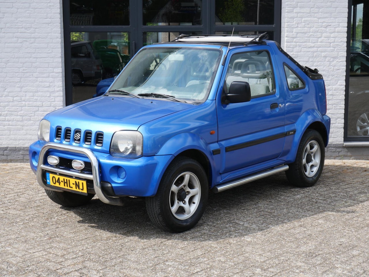 Suzuki Jimny - 1.3 JLX Cabrio 4X4 Stuurbekrachtiging Elektr. pakket - AutoWereld.nl