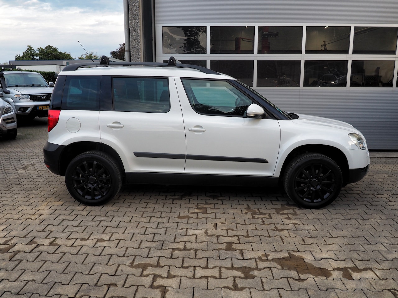 Skoda Yeti - 1.2 TSI Ambition AIRCO CRUISE LM VELGEN