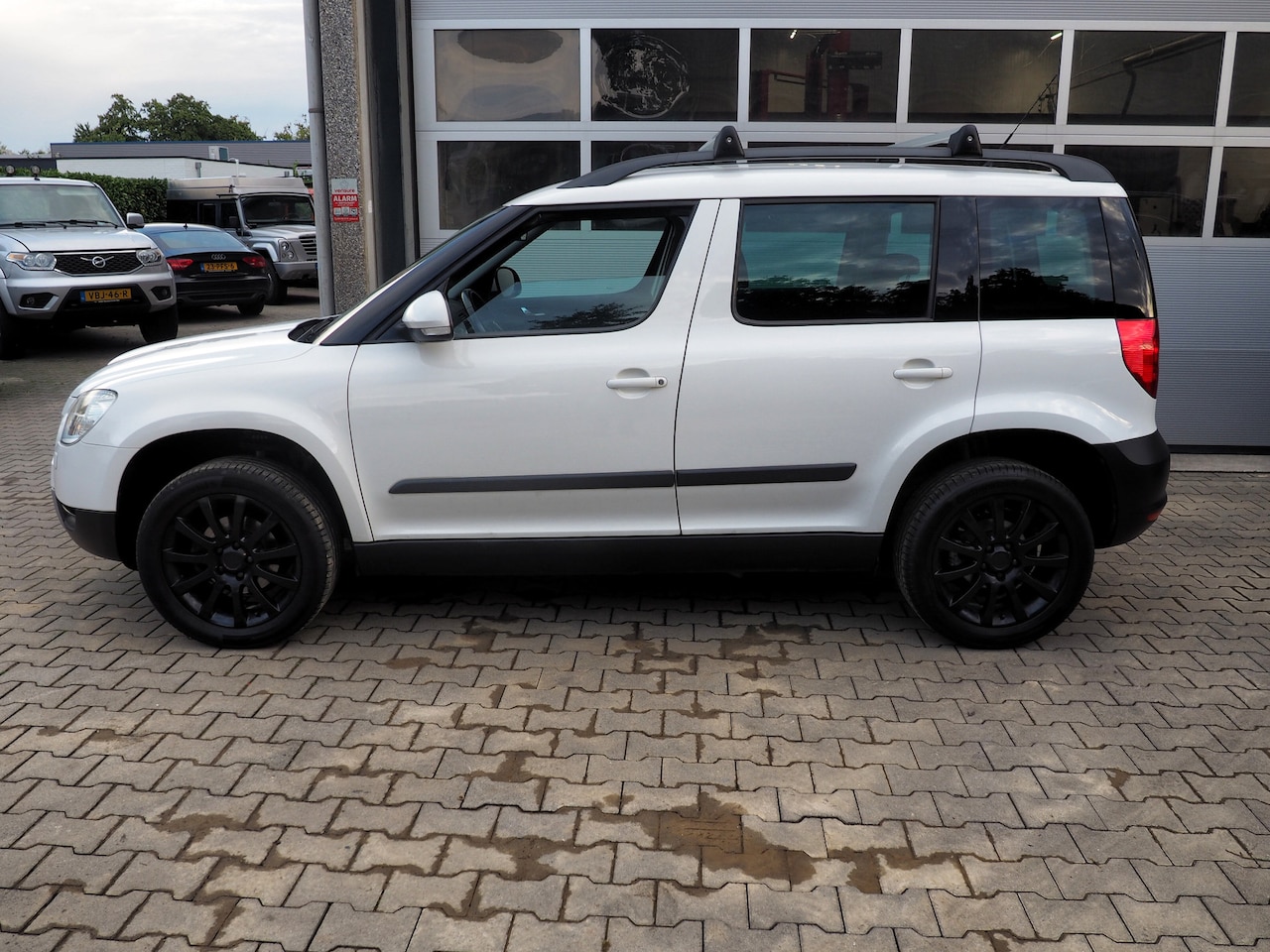 Skoda Yeti - 1.2 TSI Ambition AIRCO CRUISE LM VELGEN
