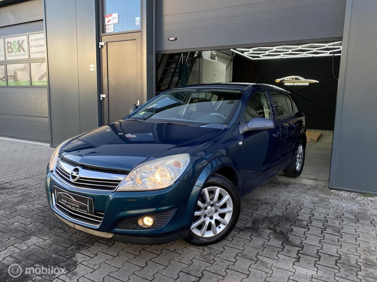Opel Astra - 1.6 Temptation |NAVI|AIRCO|TREKHAAK|PDC|CRUISE| - AutoWereld.nl