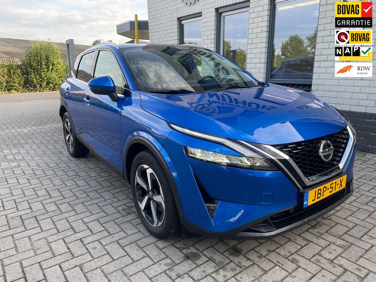 Nissan Qashqai - 1.3 MHEV Business Design / 360 camera / panorama dak / carplay / Add. Cruise / PDC V+A / T - AutoWereld.nl