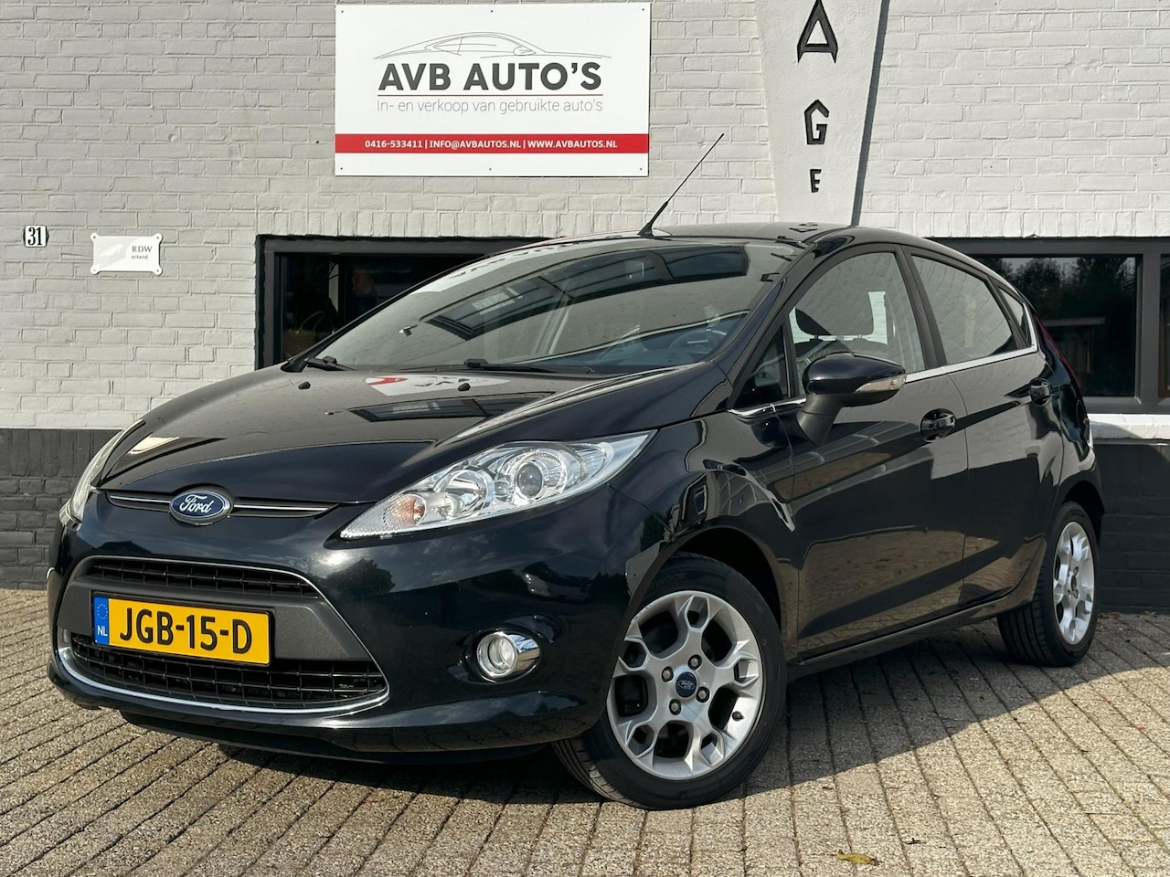 Ford Fiesta - 1.4 Titanium Clima USB Aux PDC Stoelverwarming - AutoWereld.nl