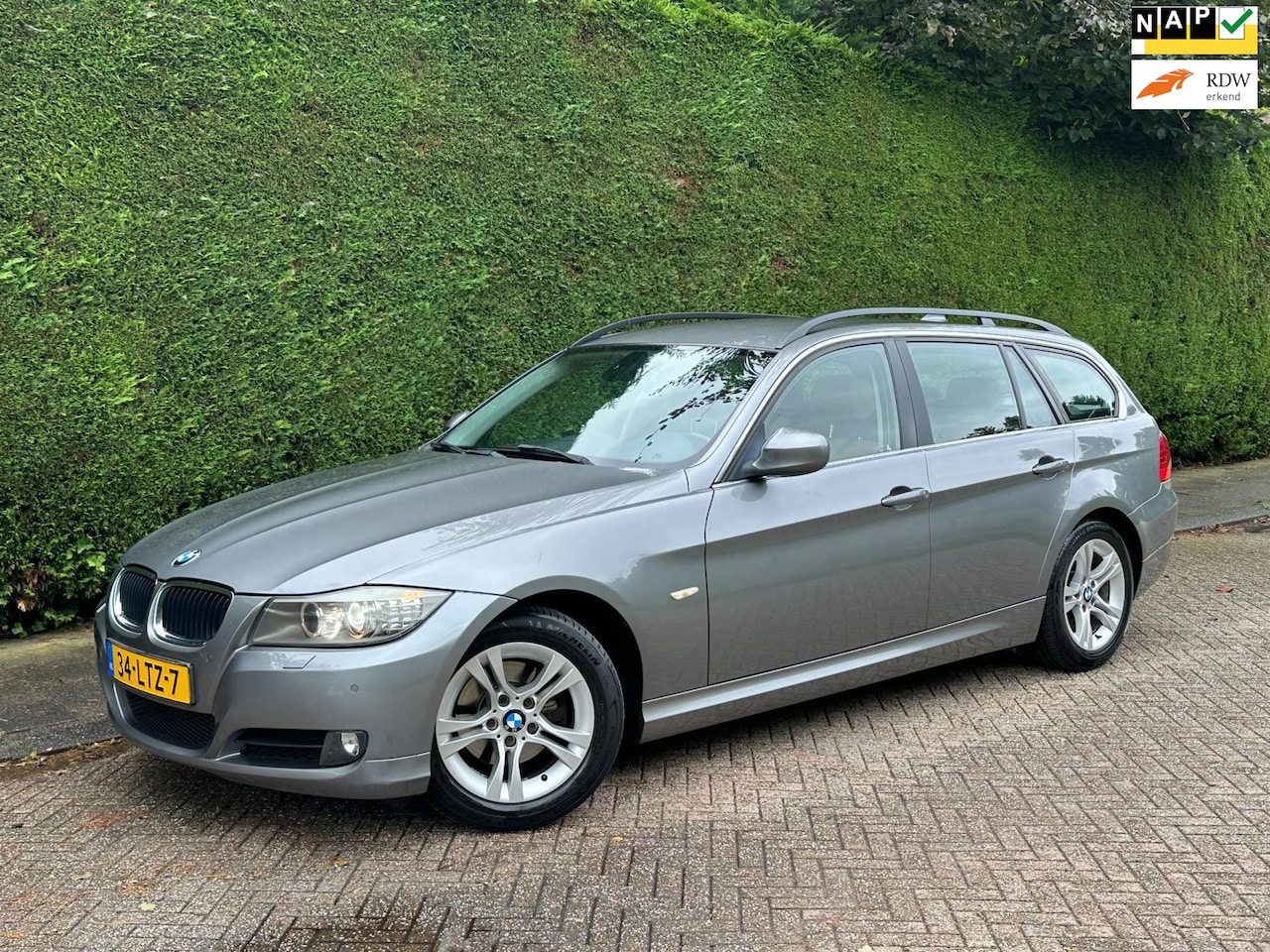 BMW 3-serie Touring - 318i /XENON/LEER/STOELVERWRMNG/PDC/CRUISE/RIJDTSUPER!/ - AutoWereld.nl