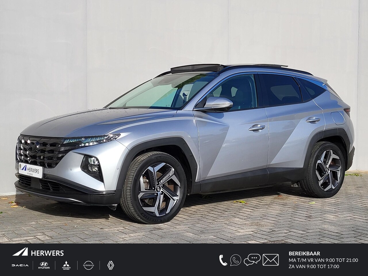 Hyundai Tucson - 1.6 T-GDI PHEV Premium Sky 4WD / Automaat / Dealer onderhouden / Glazen schuif- en kanteld - AutoWereld.nl