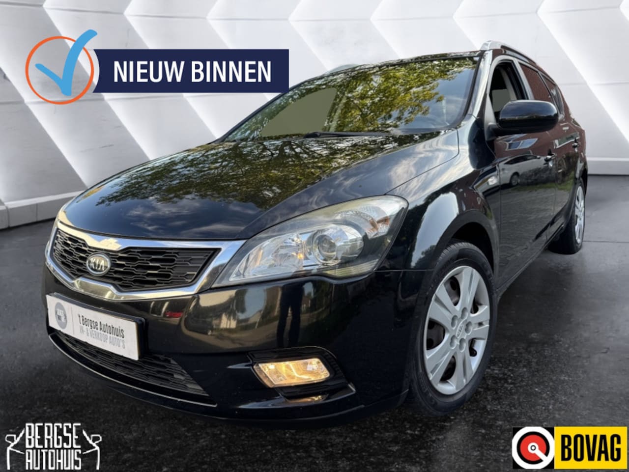 Kia Cee'd - 1.4 CVVT Seven Bns Cruise Ecc Navi BT - AutoWereld.nl