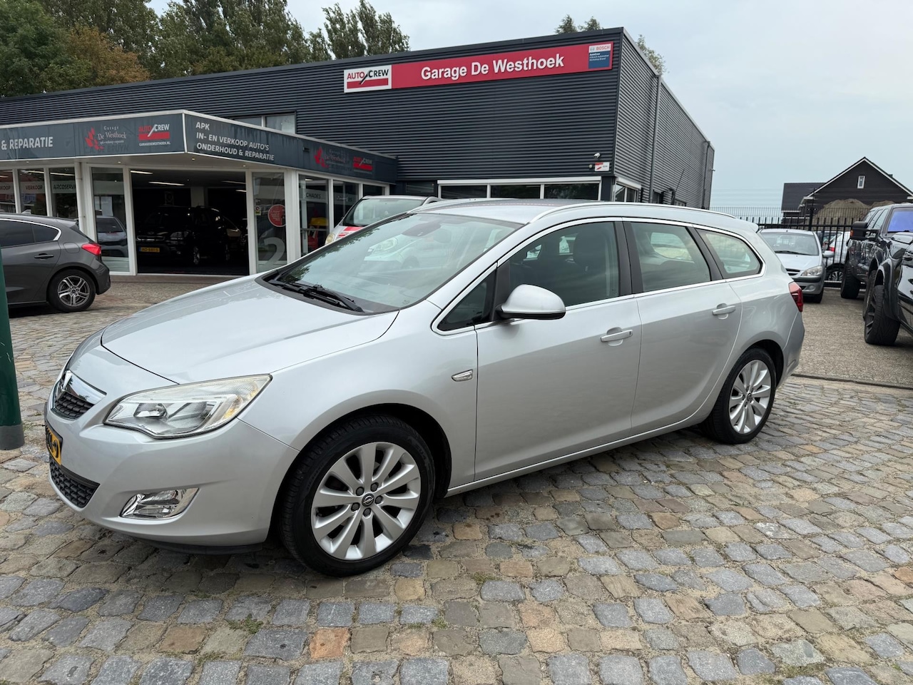 Opel Astra Sports Tourer - 1.4 Turbo Cosmo 1.4 Turbo Cosmo - AutoWereld.nl