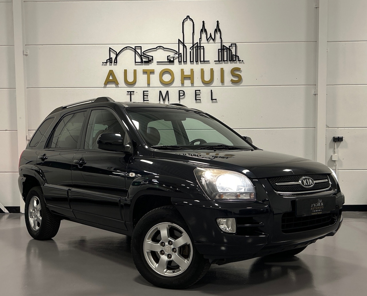 Kia Sportage - 2.0 CVVT X-ception Nap Airco Leder Stoelverwarming Trekhaak Cruise Climate - AutoWereld.nl