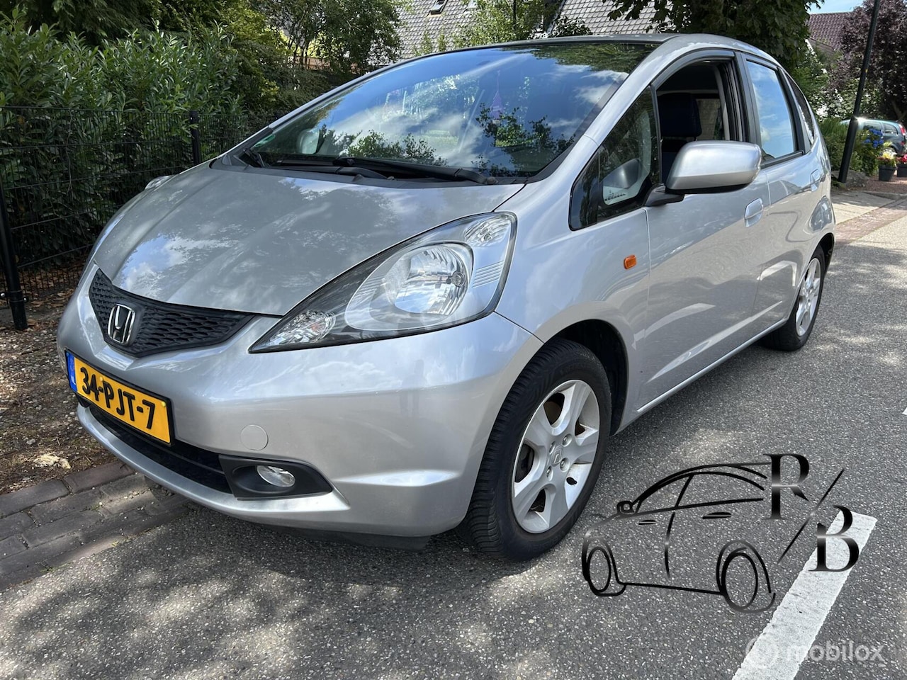 Honda Jazz - 1.2 Style Mode LEES TEKST APK AIRCO LAGE KM - AutoWereld.nl