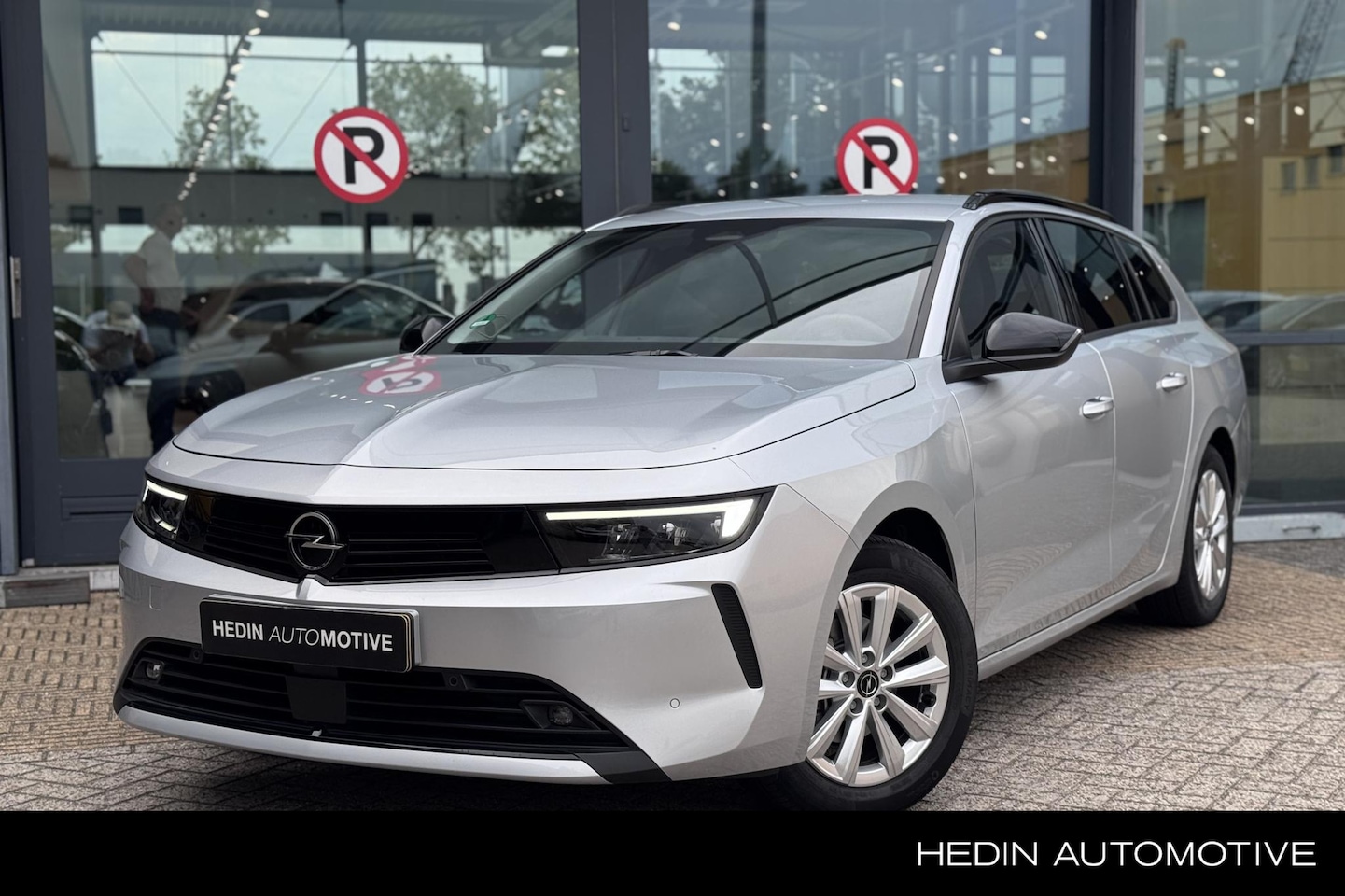 Opel Astra Sports Tourer - 1.2 Turbo Business Edition | Navigatie | Adaptive Cruise Control | Camera | Apple Carplay/ - AutoWereld.nl