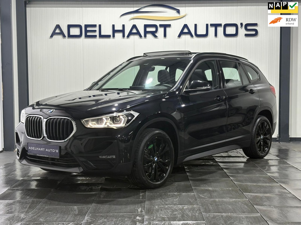 BMW X1 - SDrive18i Business Sport Line Automaat / Panorama dak / Navigatie full map / Cruise contro - AutoWereld.nl