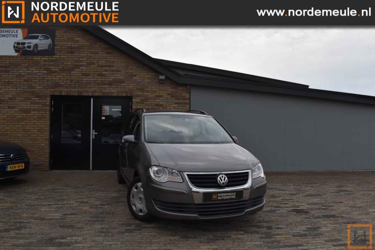 Volkswagen Touran - 1.4 TSI COMFORTL.BNS, Cruise, Navi, Clima - AutoWereld.nl
