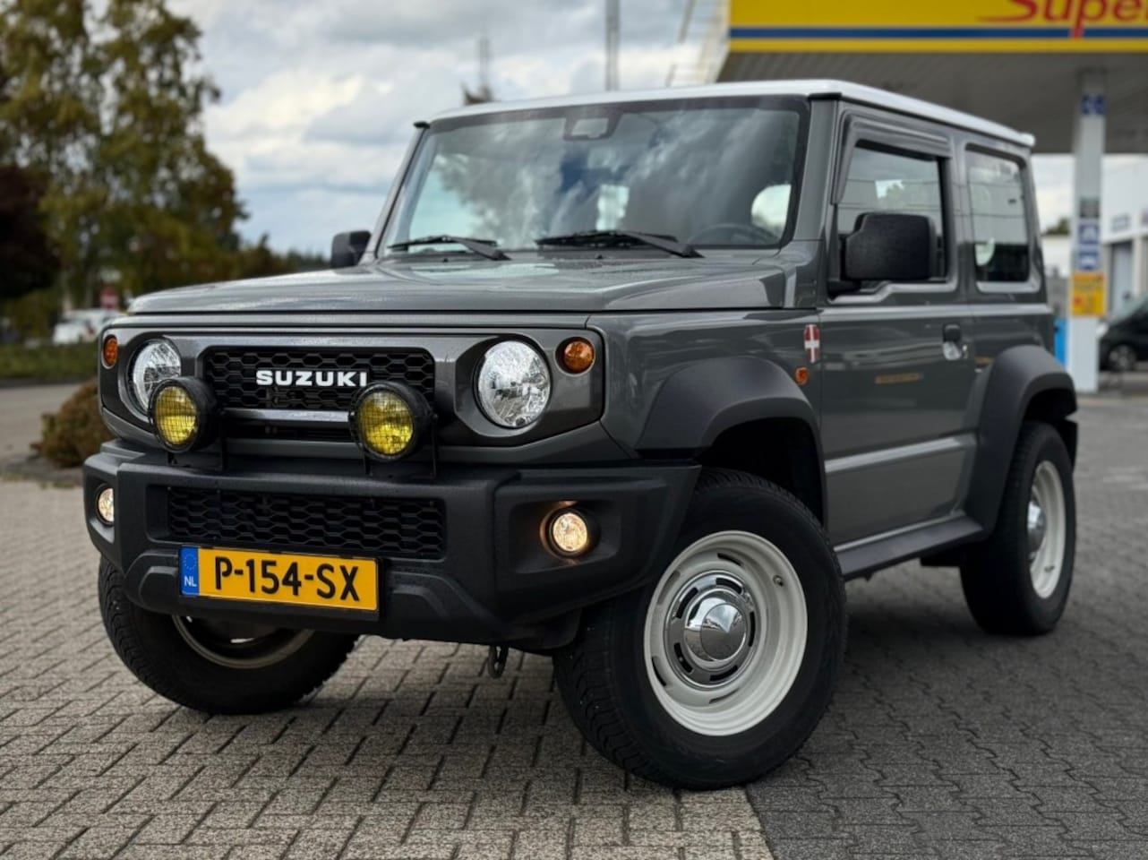 Suzuki Jimny - 1.5 RETRO LOOK TREKHAAK LEDEREN BEKLEDING - AutoWereld.nl