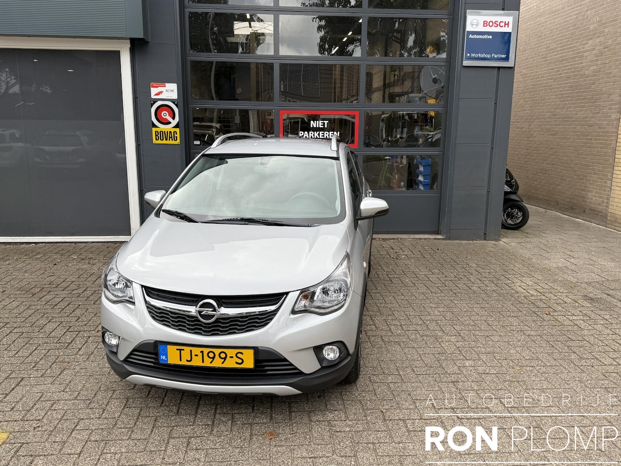 Opel Karl - 1.0 Rocks Online Edition / Airco/ Apple carplay/ Cruise/ LED/ PDC/ LMV - AutoWereld.nl