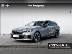 BMW i5 Touring - M60 xDrive 84 kWh 21 Inch / Stuurwielrand verwarming / Stoel verwarming Voor & Achter / Co