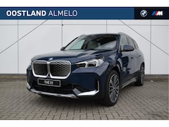 BMW iX1 - eDrive20 High Executive xLine / Panoramadak / Trekhaak / Sportstoelen / Adaptieve LED / Pa