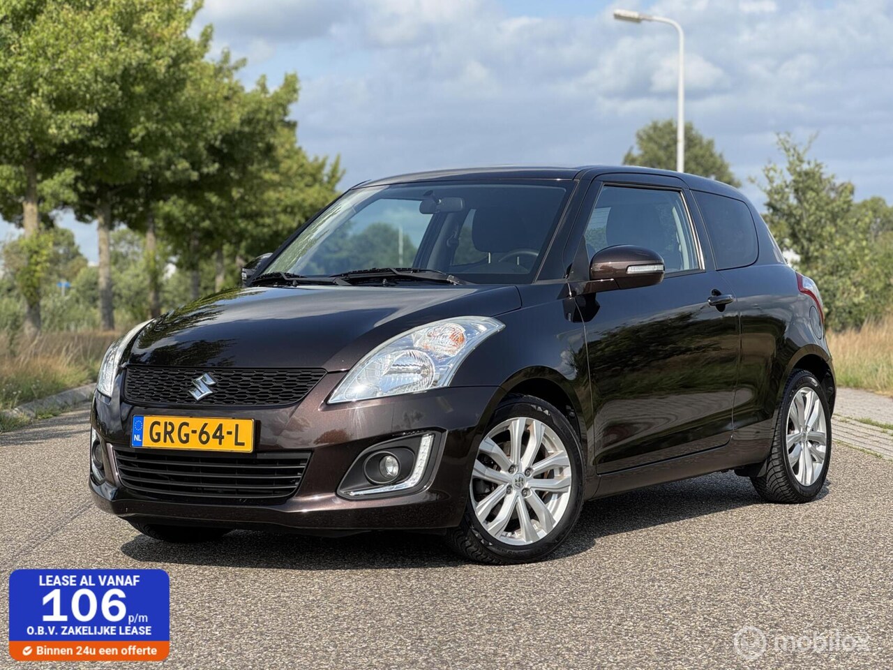 Suzuki Swift - 1.2 Exclusive EASSS Bison Brown 2015 - AutoWereld.nl