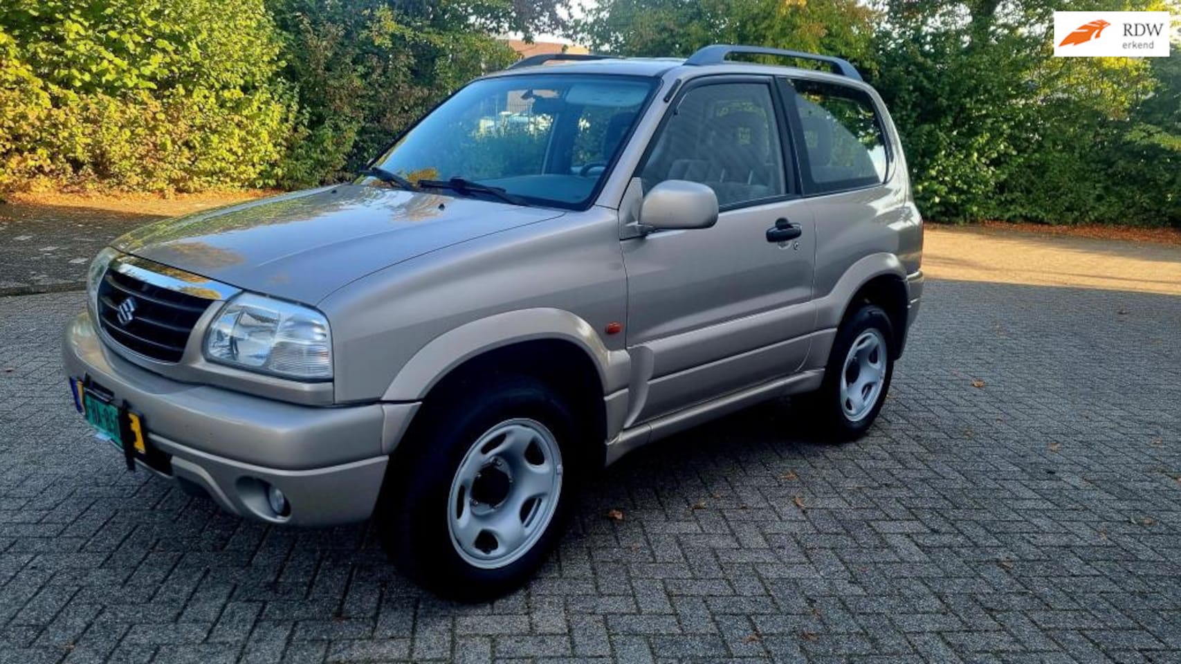 Suzuki Grand Vitara - 1.6 Metal Top Wide Body 1.6 Metal Top Wide Body - AutoWereld.nl